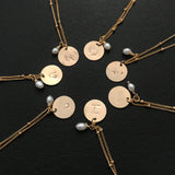 The Zodiac Necklace - 14k gold-filled chain necklace with zodiac stamped pendant and freshwater pearl, by Elvis et moi
